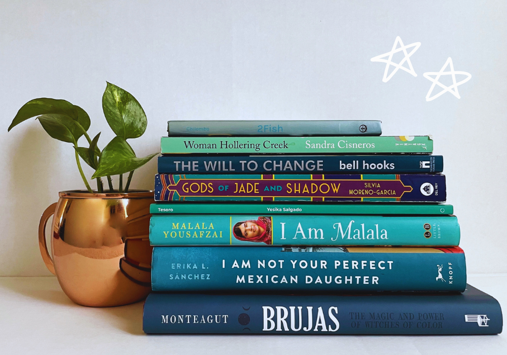 teal book stack with pothos plant in a copper mule mug